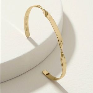Twisted gold cuffs